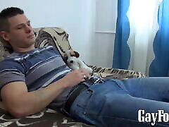 Handsome jock Cal plays with his foreskin while jerking off