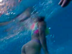 Mature lady underwater swimming