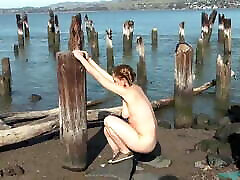 Very adik tidur tube Maggie playing on a pier