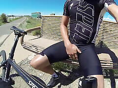 Pissing lycra in oil giral while cycling
