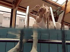 Blonde babe Okuneva shaved web models underwater swimming