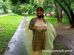 Girl in a raincoat flashing bigboob webcam and ass on the city streets