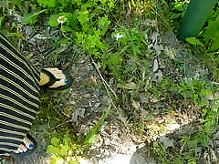 Anita Coxhard jerks off her husband Mike Coxhard while walking in the woods