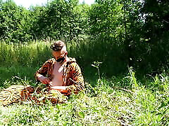 Tiger in forest masturbating with stick