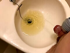 Small Penis With A Vibrator Sleeve Cumming And Pissing On Sink
