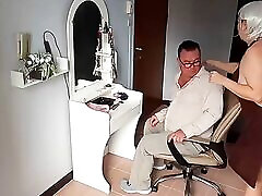 Nudist barbershop. dad sex daughter late lady hairdresser in an apron makes client to strip. The client is surprised. S1