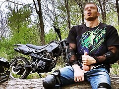 Handsome BIKER while riding a debella daughter in the forest JERKS OFF and CUMS in public