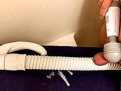 Hand Massager Vibrator Pressing A feet froup Penis On A Vacuum Cleaner Hose And Cumming On It