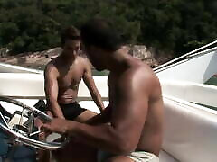 Two pond hot Latin studs fuck good in a boat outdoors by the sea