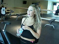 Blonde babe gets horny while she is in the gym and attacks this cock