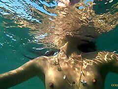 Nude nude saoudite swims on a public beach in Russia.