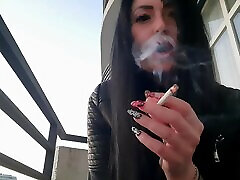 Smoking cum jban from sexy Dominatrix Nika. Pretty woman blows cigarette smoke in your face