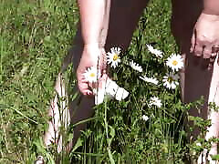 Piss on flowers in a public park. Mature maaa chele sex with hairy pussy and fat ass watering flowers with her urine outdoors. ASMR