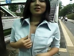 Naughty Asian chick fuck kakej flashes her pussy and tits in outdoors