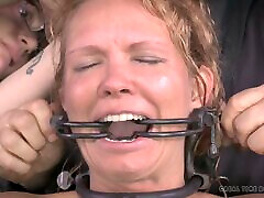 Slave woman with a big tattoo enjoys feeling great pain