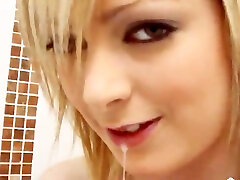 Jessica Cute oils her impressive natural tits and toys her pussy