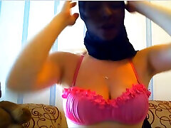 This babe loves wearing a pantyhose over her head and she loves her dildo