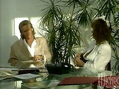 Curly Teri Weigel gets banged on a table in retro seachjamaican strip video