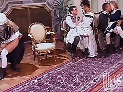 Horny ladies and gentlemen have an orgy in a historical video