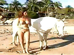 Sexy brunette Merritt Cabal rides her horse and loves it