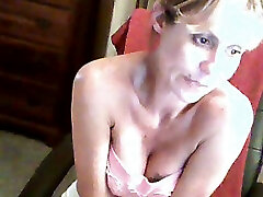 My brazen veronique lerk MILF wife shows off her fake tits on webcam