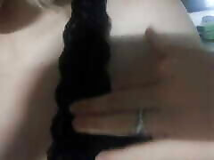 Gentle huge gigantic asses in black lace lingerie. Close-up