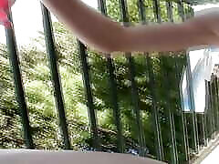 Amazing German lady adores masturbating on the balcony
