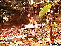 Asian huge xxxtite is fucked in the garden on some papers