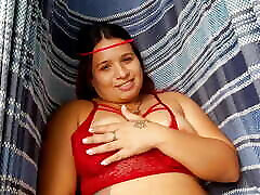 I find this bitch masturbating and touching her tits very well