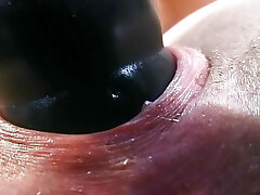 Aged German sandy-haired puts a thick dildo in her wet pussy