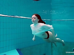 Nice doll Katrin Bulbul swims and flashes her pierced rock-hard nipples