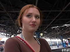 Red-haired Eurobabe flashes her big tits in bus station