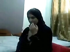 Middle East amateur brunette nympho in traditional gown shows off her titties