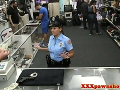 Real cop flashes her milk cans to pawnbroker for cash