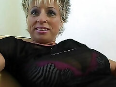 Old German chick with huge congenital tits playing with her sex toy