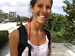 Cute and busty brunette strokes off a man she met at the beach until he explodes