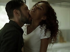 Curly haired babe Scarlit Scandal mounts her cooter on a milky cock