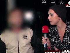 Real public displaying at street casting with unknown people