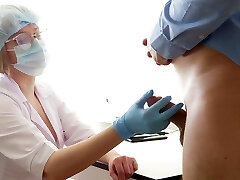 Busty Doctor milking the prostate. Stuck her finger up the backside