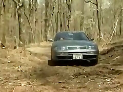 Fellow rapped Japanese teen on the truck of his car