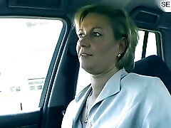 Mature German bitch plows dildo in nature
