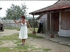 Beautiful and delicious sandy-haired busty teen in the vineyard