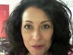 Dirty mature Danica Collins flashes her hairy poon and tits