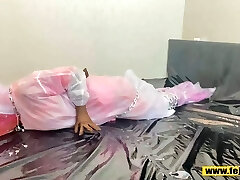 Fejira com Multi-layer plastic raincoat packaged around the chains of the girl