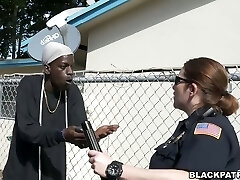 Two trampy police officers take advantage over black scofflaw