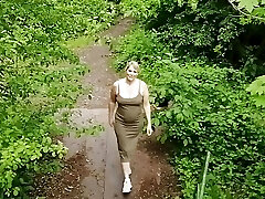 Blowing on the bridge in the woods