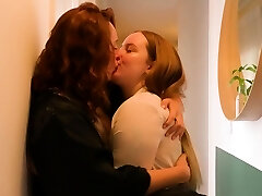 Curly redhead unloads during lesbian finger fucking