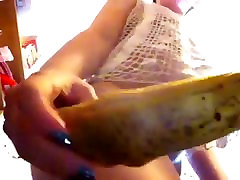 Girl fucks herself in the ass with a banana