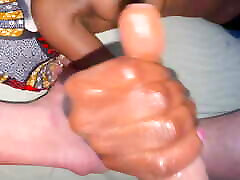 Giving daddy a handjob what n the couch