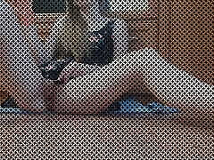 Young milf fucks herself in the mirror